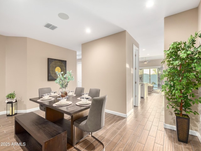 dining space featuring ceiling fan