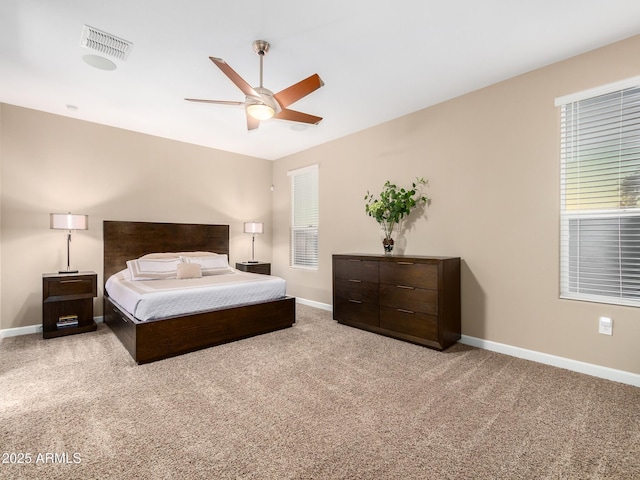 carpeted bedroom featuring ceiling fan