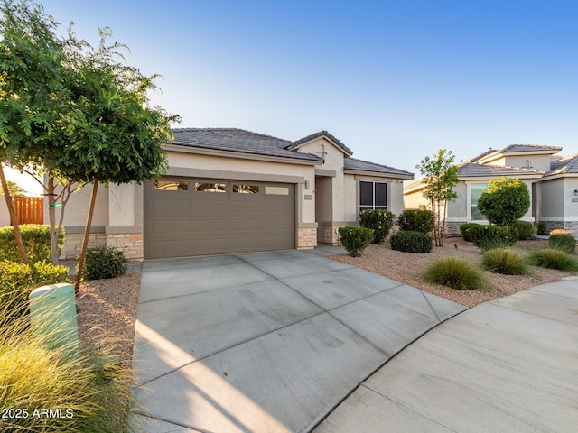 view of front of property with a garage