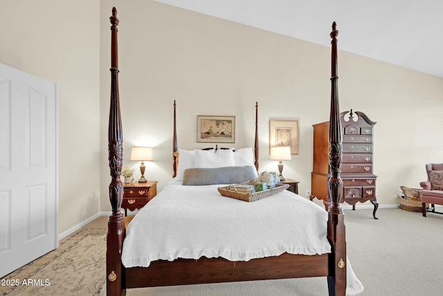 carpeted bedroom featuring lofted ceiling