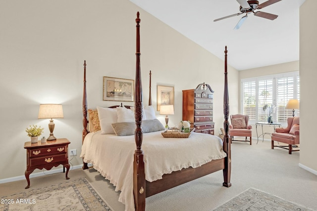 bedroom featuring carpet floors, vaulted ceiling, and ceiling fan