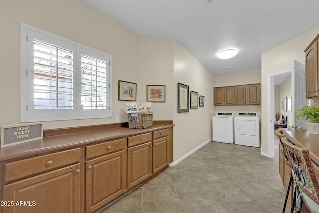 laundry room with washer and dryer