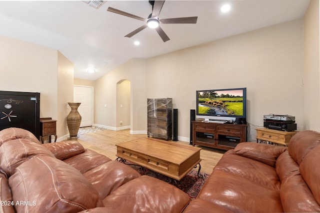 living room featuring ceiling fan and wood-type flooring