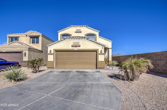 view of front of property with a garage