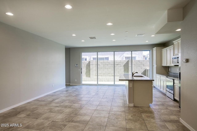 4242 E Erie St, Gilbert, AZ 85295 - kitchen featuring stainless steel electric range oven, white microwave, a sink, baseboards, and recessed lighting