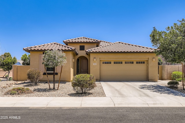 7665 W Fetlock Trl, Peoria, AZ 85383 - view of front facade featuring a garage, a tiled roof, and stucco siding