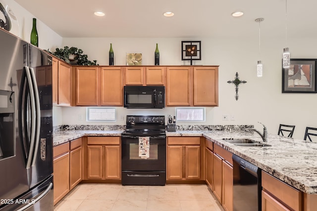 7665 W Fetlock Trl, Peoria, AZ 85383 - kitchen featuring black appliances, a peninsula, light stone counters, recessed lighting, and decorative light fixtures