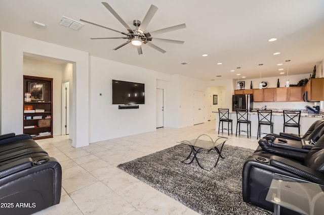 7665 W Fetlock Trl, Peoria, AZ 85383 - living area with a ceiling fan and recessed lighting