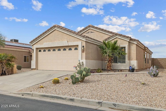 24108 N Nectar Ave, Florence, AZ 85132 - mediterranean / spanish-style house featuring driveway, a tile roof, a garage, and stucco siding