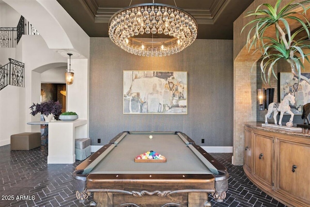 playroom with ornamental molding, pool table, a chandelier, and a tray ceiling