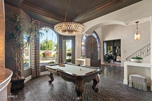 recreation room with a tray ceiling, crown molding, and billiards