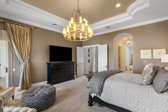 carpeted bedroom featuring crown molding, a raised ceiling, and a chandelier