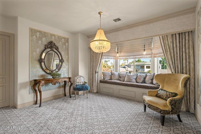 living area featuring a notable chandelier