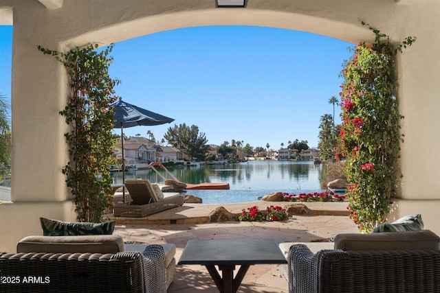 view of patio / terrace with a water view