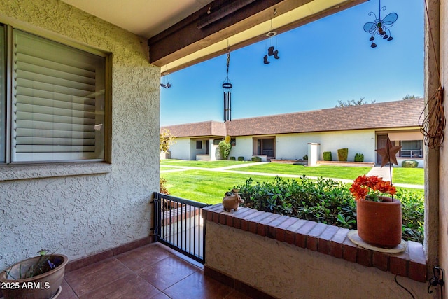 view of patio with a balcony