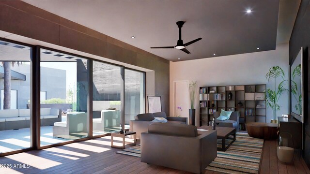 living room with ceiling fan and hardwood / wood-style flooring