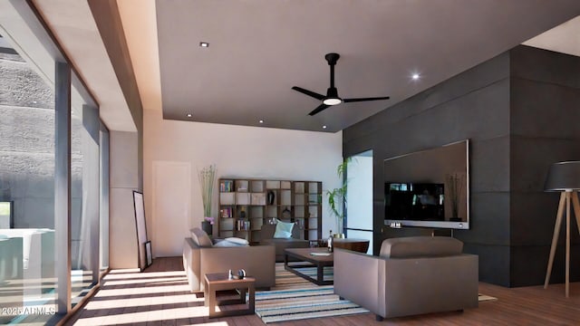 living room with ceiling fan, a healthy amount of sunlight, and hardwood / wood-style flooring