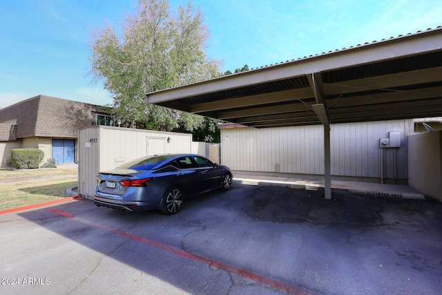 view of parking featuring a carport