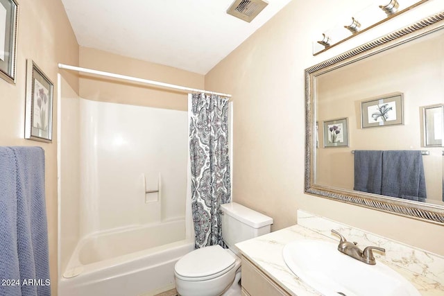 full bathroom with shower / bathtub combination with curtain, vanity, and toilet