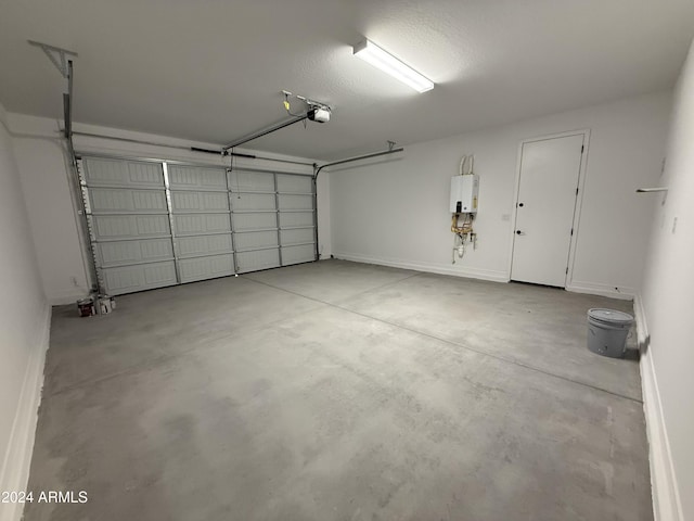 garage with a garage door opener and water heater