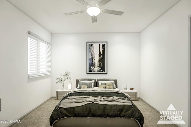 bedroom featuring light carpet and ceiling fan