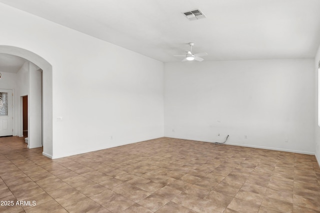 unfurnished room featuring ceiling fan