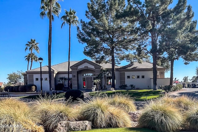 exterior space featuring a front lawn