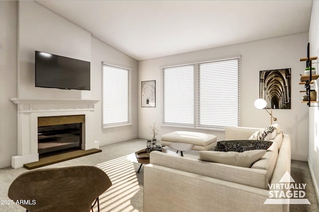 living room featuring lofted ceiling and light colored carpet