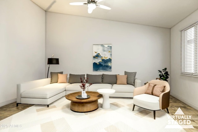 living room featuring ceiling fan