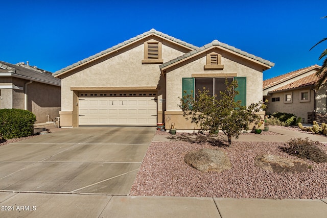 view of front of home with a garage