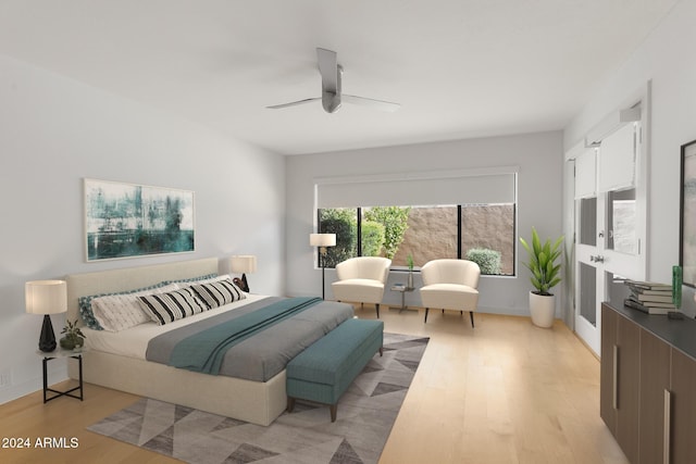 bedroom featuring ceiling fan and light hardwood / wood-style floors