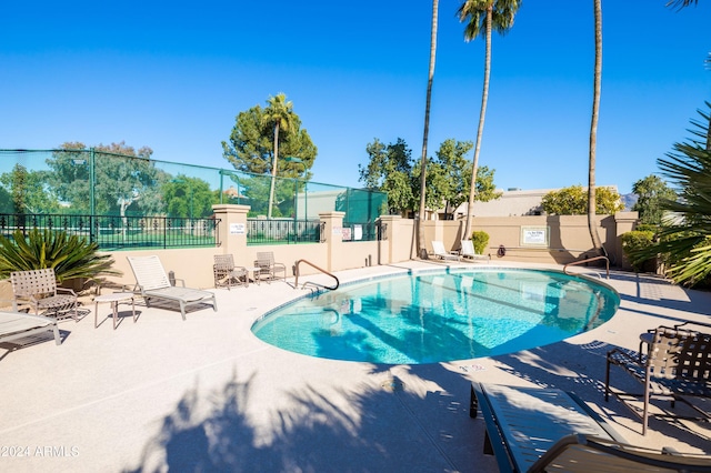 view of pool featuring a patio area