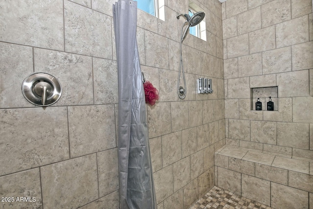 bathroom featuring walk in shower