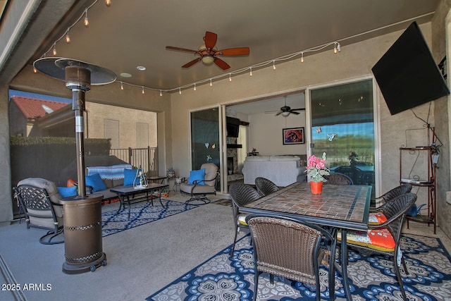 view of patio with ceiling fan