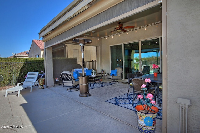 view of patio with ceiling fan