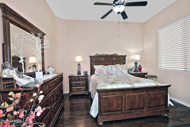 bedroom featuring dark wood-type flooring and ceiling fan