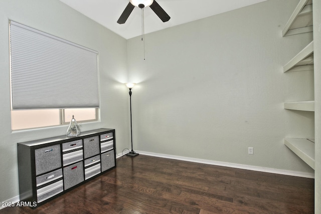 interior space featuring ceiling fan and dark hardwood / wood-style flooring