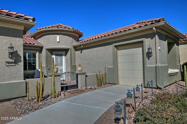 view of side of property featuring a garage