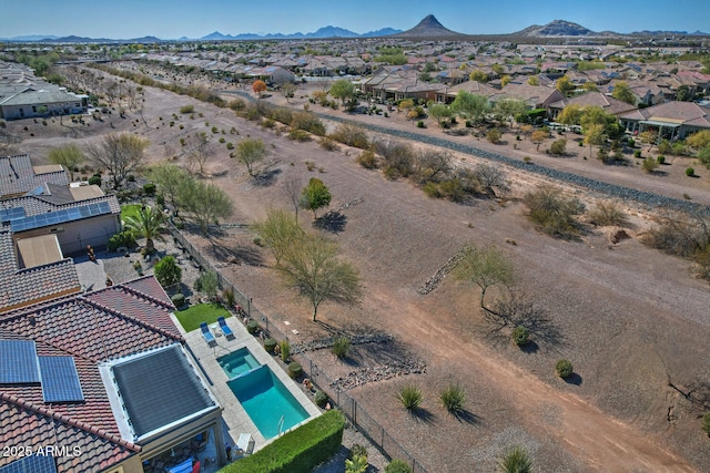 drone / aerial view featuring a mountain view