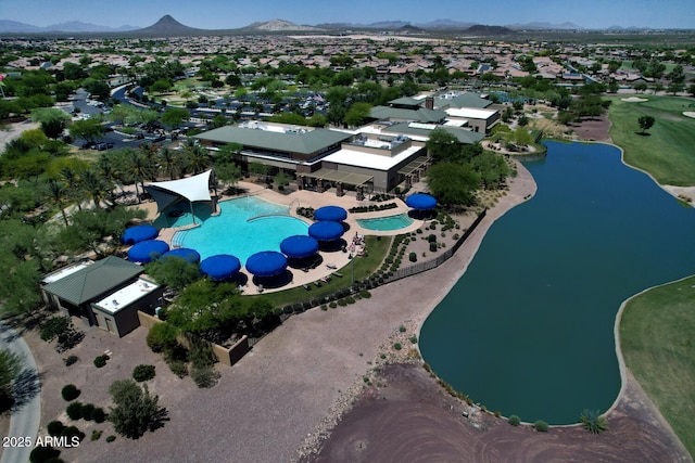 bird's eye view with a water and mountain view