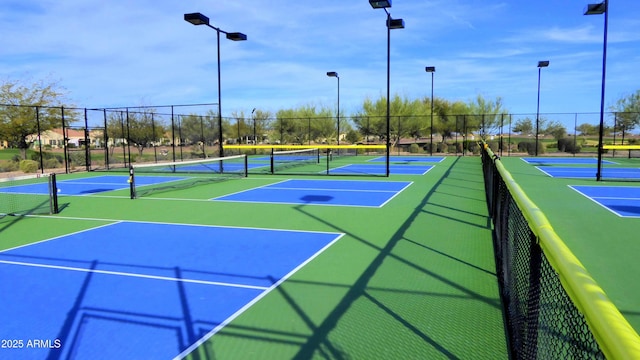 view of sport court with basketball hoop