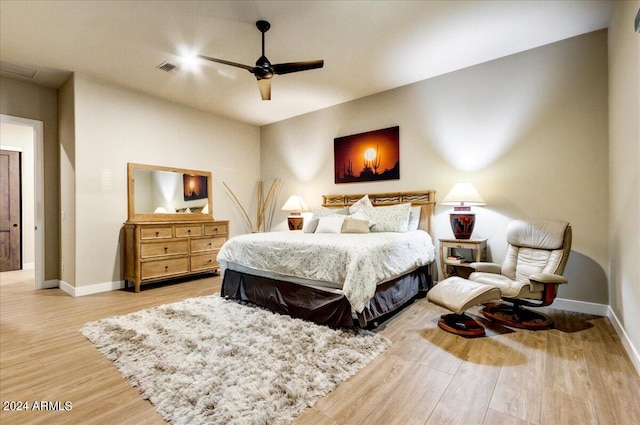 bedroom featuring ceiling fan and light hardwood / wood-style floors