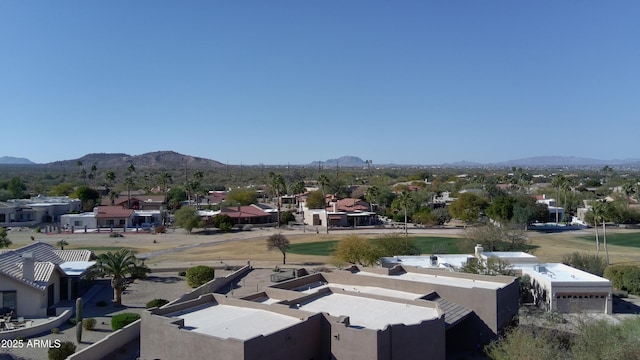 birds eye view of property featuring a mountain view