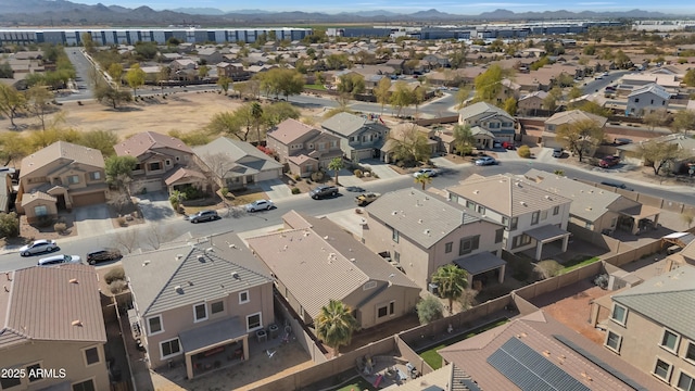 drone / aerial view featuring a mountain view and a residential view