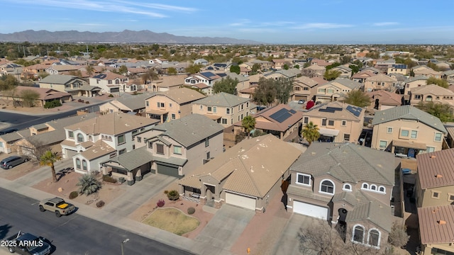 bird's eye view featuring a residential view and a mountain view