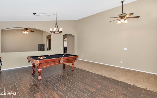 game room with wood tiled floor, ceiling fan, lofted ceiling, and baseboards