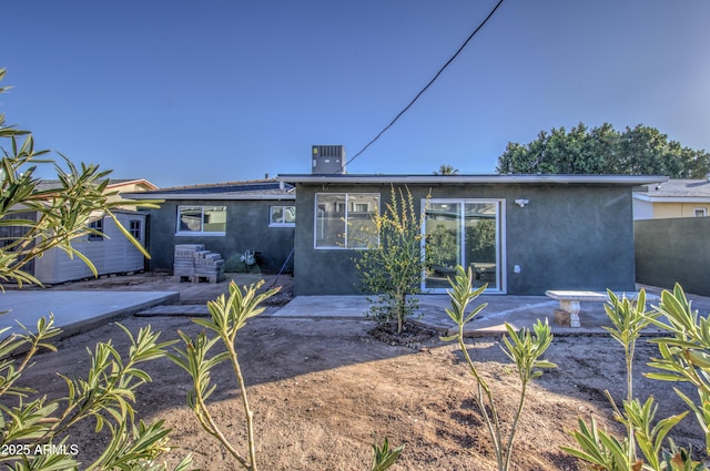 rear view of property with a patio