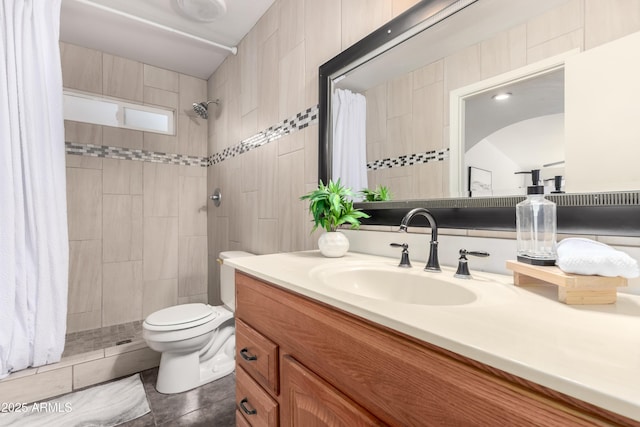 bathroom featuring vanity, toilet, and walk in shower