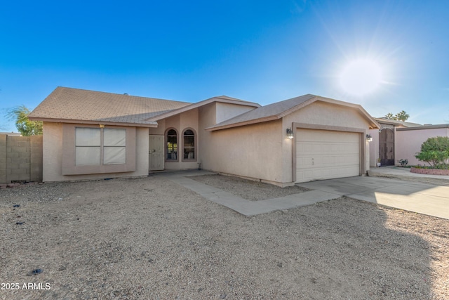 ranch-style home featuring a garage