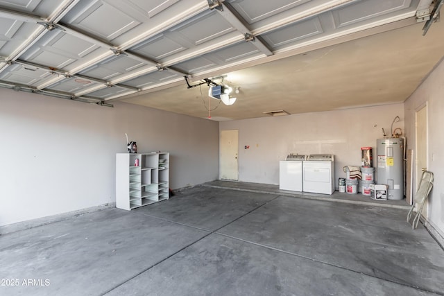 garage with a garage door opener, water heater, and separate washer and dryer